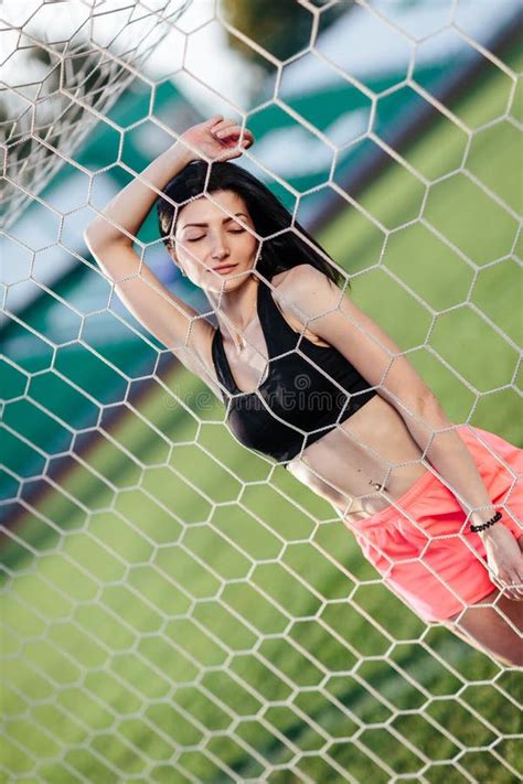 Front View Of Woman Hold Ball In Hand After Penalty Kick Goalkeeper