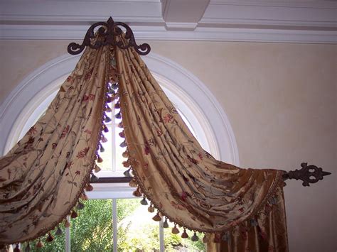 Not really a modern design. Best Selections of Curtains for Arched Windows - HomesFeed
