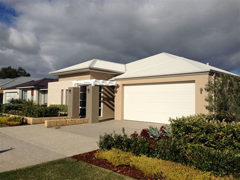 I have a reddish/brownish brick house and paperbark garage door, windows, gutters, facias, downpipes and feature render 'bands'. Paint rendered walls - colourbond sandbank. Paint beams ...