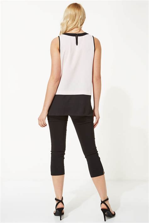 Dragonfly sunset allows you to embrace this symphony of colour whilst simultaneously using it to construct a visual the electricity of the pinks allows you to work in darker shades of purple and black into your room without removing… Colour Block Contrast Vest Top in Light Pink - Roman ...