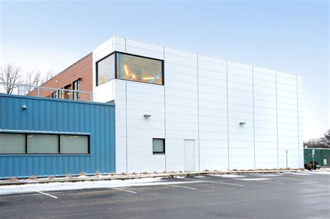 Insulated Metal Panels Offer Chic Industrial Warehouse Aesthetic For High End Retailer