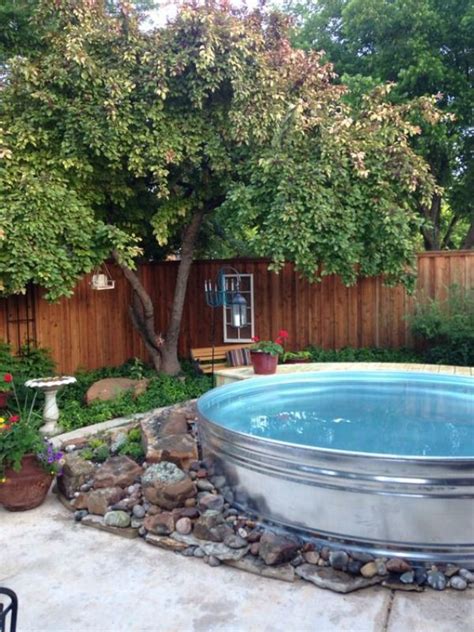 The blue tile really adds so. Stock Tank Pools Are Coming To A Backyard Near You This ...