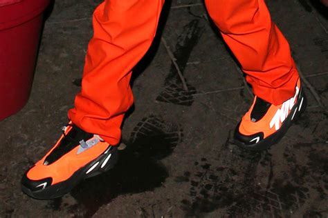 North West Wears Orange Outfit In Paris Adidas Yeezy Boost 700 Mnvn