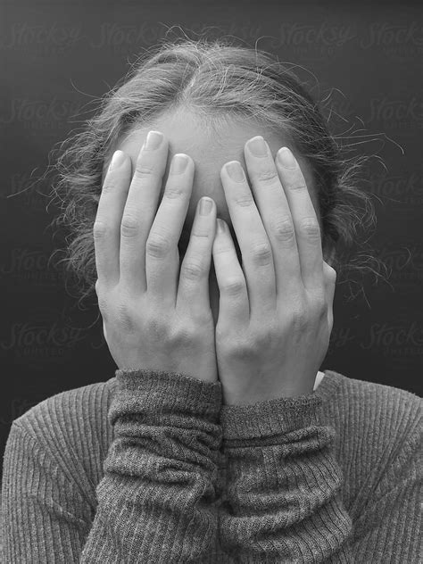 Portrait Of Teenage Girl With Hands Covering Face Close Up By Rialto