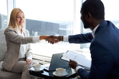 Two Business People Shaking Hands Stock Image Image Of Caucasian