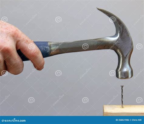 Hammering In A Nail Stock Photo Image Of Indoors Force 26861986