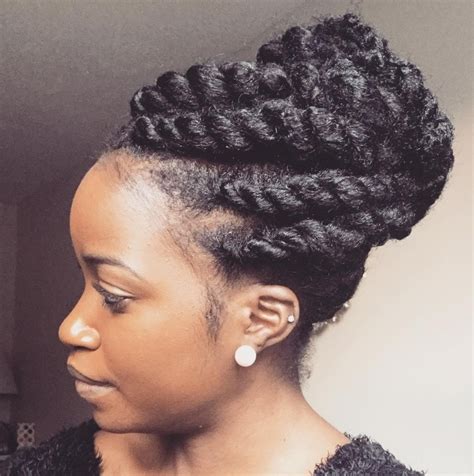 The hair is styled up at the back with beautiful twists at the front. 2021 Latest Two Strand Twist Updo Hairstyles for Natural Hair