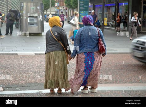 Asian Refugee Dressed Hijab Scarf On Street In The Uk Everyday Scene