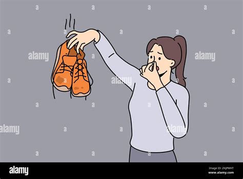 Woman Hold In Hands Smell Disgusting Dirty Shoes Disgusted Girl Cover