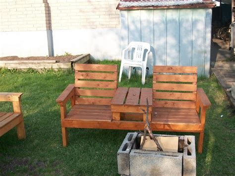 These free garden bench plans on youtube will show you how to use cinder blocks and lumber to build a sturdy bench fast, cheap, and without power tools. diy double chair bench with table | Chair bench, Chair, Outdoor chairs