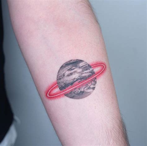 Hand Poked Saturn Tattoo Located On The Inner Arm