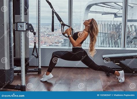 beautiful girl exercises with fitness expander in the gym stock image image of fitness