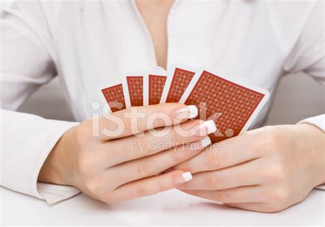Womans Hands Holding Playing Cards Stock Photo Royalty Free Freeimages