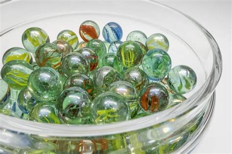 Close Up Of Colored Glass Marbles In A Glass Jar Stock Photo Image Of