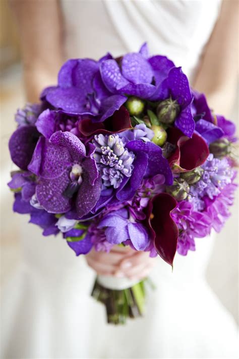 Each rose head had a diamante pin in the centre and to bring in a hint of the purple we added lots of purple crystals. 25 Stunning Wedding Bouquets - Best of 2012 | Purple ...