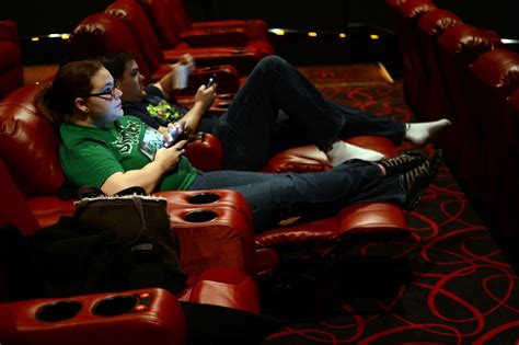 Heated seats, lounge chairs, and dinner brought to. AMC Courthouse's cushy recliners reflect the future of ...