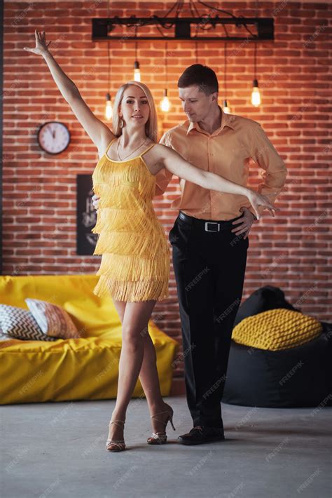 Premium Photo Young Couple Dancing Latin Music Bachata Merengue Salsa Two Elegance Pose On