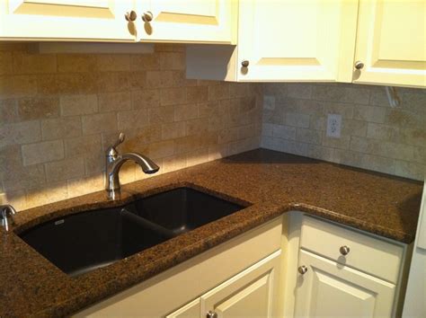 Granite Countertop And Natural Stone Backsplash Traditional Kitchen