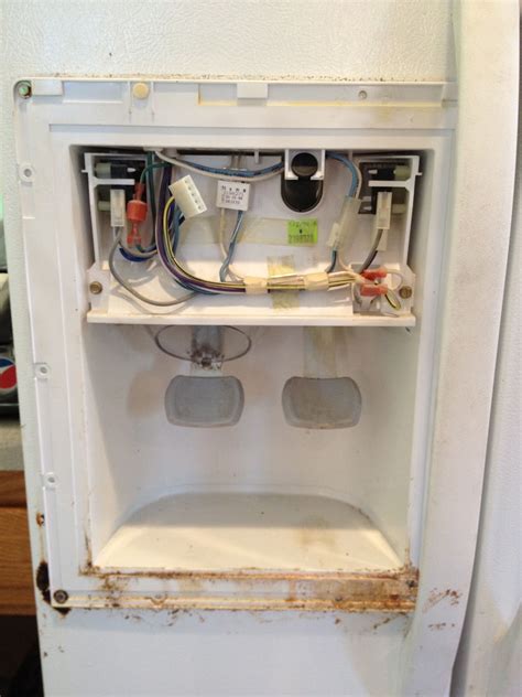 How to Repair the Seal on the Ice Dispenser Door on a Kenmore Coldspot