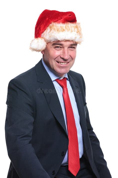 Seated Old Business Man Wearing A Christmas Hat Is Smiling Stock Image Image Of Decoration