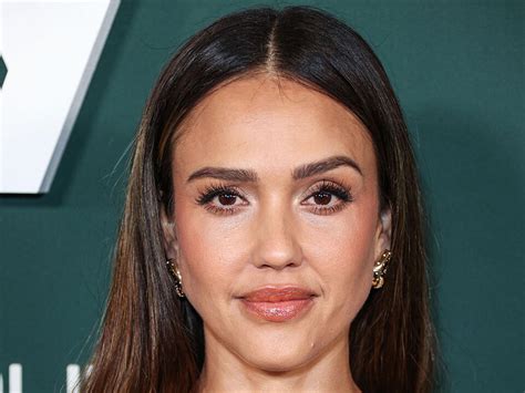 Jessica Alba Shows Off Her Fit Figure In A Gold And Silver Gown For