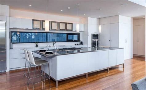 White Kitchen Cabinets with Dark Countertops - Designing Idea