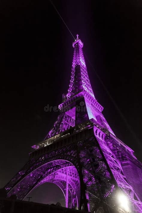 The Iconic Eiffel Tower Illuminated At Night In Paris France Stock