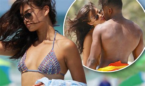 Shanina Shaik and shirtless fiancé DJ Ruckus share kiss on Miami Beach