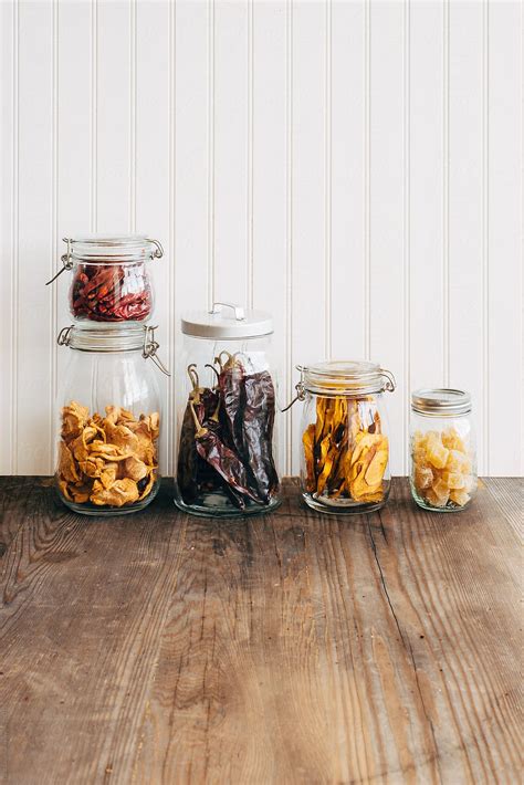 Dried Mango Apple Peppers And Ginger In Glass Jars Del