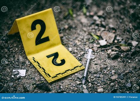 Crime Scene Evidence Marker Next To Syringe Stock Photos Free