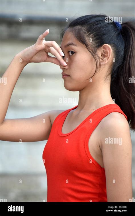 Beautiful Asian Teenager Girl And Smell Stock Photo Alamy