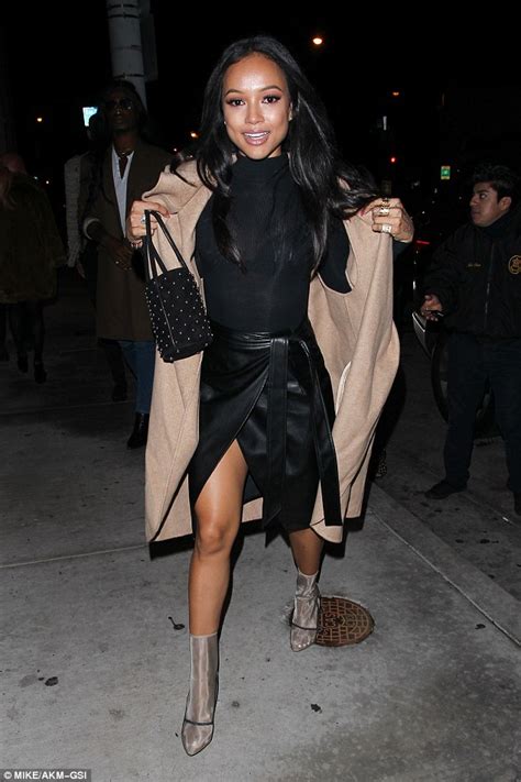 karrueche tran flashes legs as she goes for sophisticated sexy style in la daily mail online