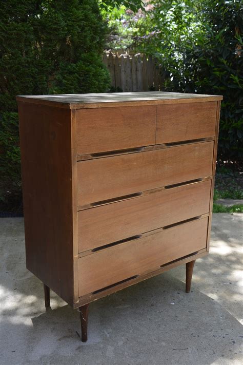Maybe you would like to learn more about one of these? BEFORE & AFTER: Mid-Century Modern Dresser Makeover