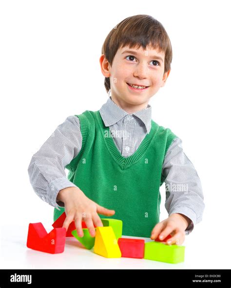 Smiling Little Boy Is Building Stock Photo Alamy