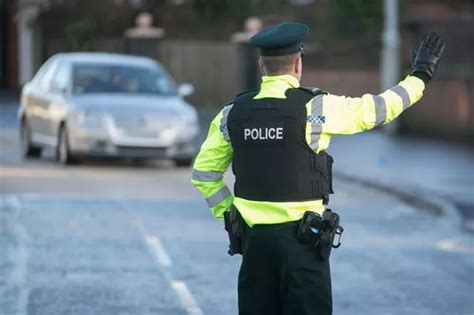 police shock as blindfolded woman shouts at them from car belfast live