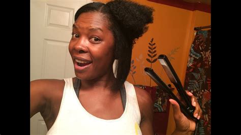 I wore my hair straight a week ago with okay results after flat ironing with some palmers oil spray that i found in my daughter's bathroom. I flat ironed my natural 4b/4c hair with low heat! - YouTube