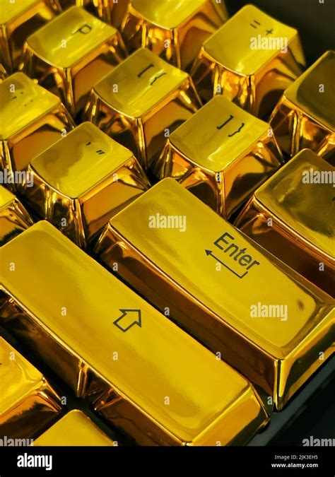 Computer Keys On A Gold Keyboard Stock Photo Alamy