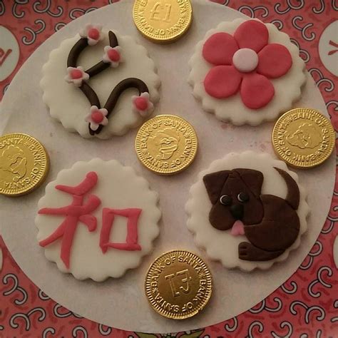 Traditional chinese new year food tends to signify health, prosperity or luck. Chinese New Year - Year of the Dog cupcake toppers by Chris'sTop Cakes #Chinese New Year #Year ...