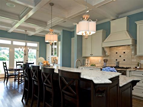 Although coffered ceilings draw the eye upward, the beams extend downward into a room, taking up some overhead space. Photo Page | HGTV