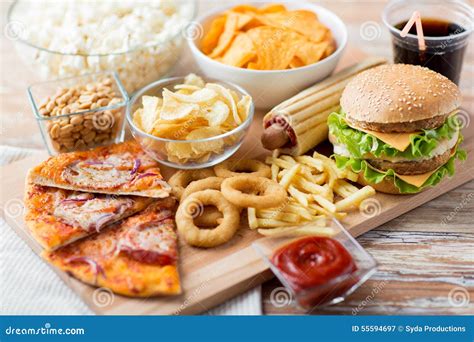 Close Up Of Fast Food Snacks And Drink On Table Stock Image Image Of