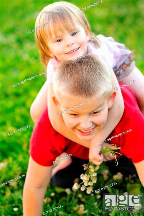 Portrait Of Little Boy And Girl Outdoors Stock Photo Picture And Low