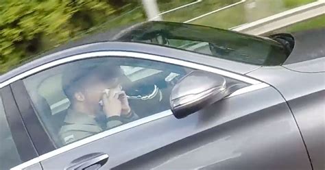 Vigilante Biker Catches Motorist Eating Bacon Butty While Driving At
