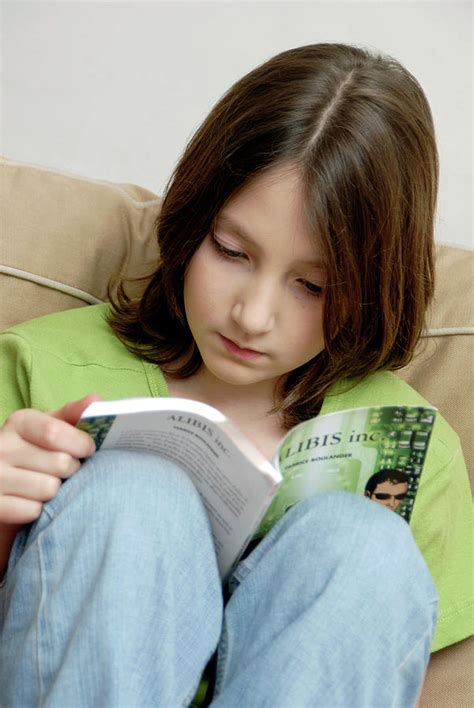 Girl Reading A Book Photograph By Aj Photoscience Photo Library Fine