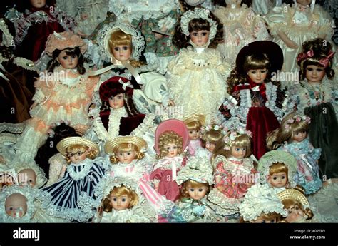 Display Of Group Of Exquisitely Dressed English Porcelain Dolls Stock