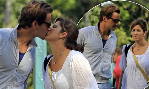 I discovered ways to express myself better and to. Roger Federer puckers up to his wife as they stroll around ...