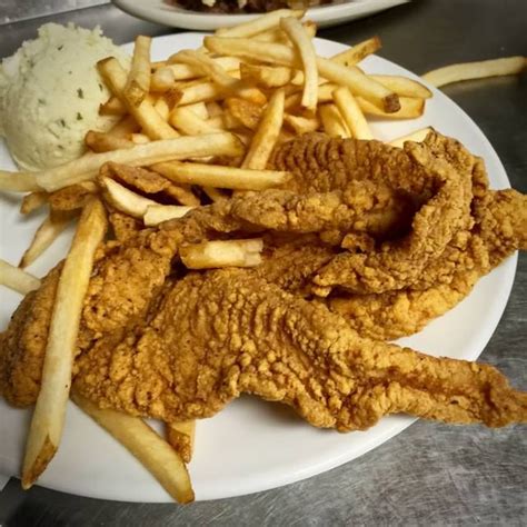 Fresh catfish seasoned with our house blackened spices and seared on the grill. Catfish plate with 2 sides - Mother's Restaurant in New ...