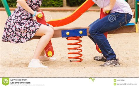 Couple Playing On Playground Stock Image Image Of Legs Couple 105257791
