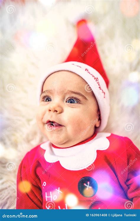 Baby Boy Wearing Santa Clothessmiling Baby Boy In Santa Claus Costume