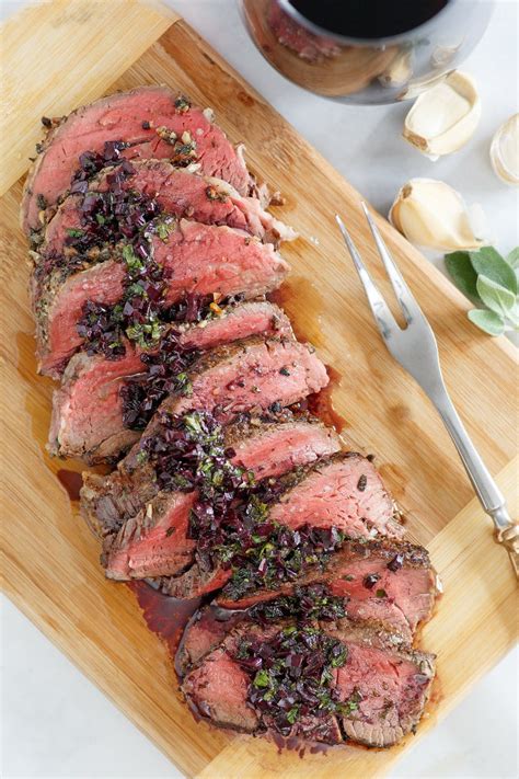 This tender, melt in your mouth beef tenderloin roast recipe is easy to prepare and absolutely delicious. Roasted Beef Tenderloin with Merlot- Shallot Sauce