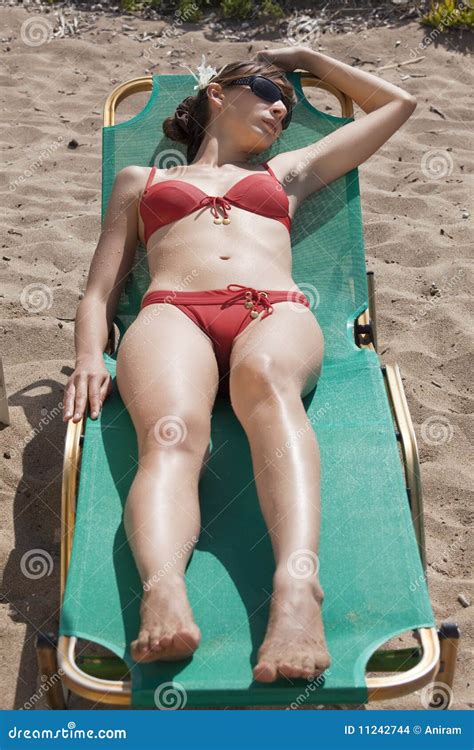 Woman In Bikinis Sunbathing Stock Images Image